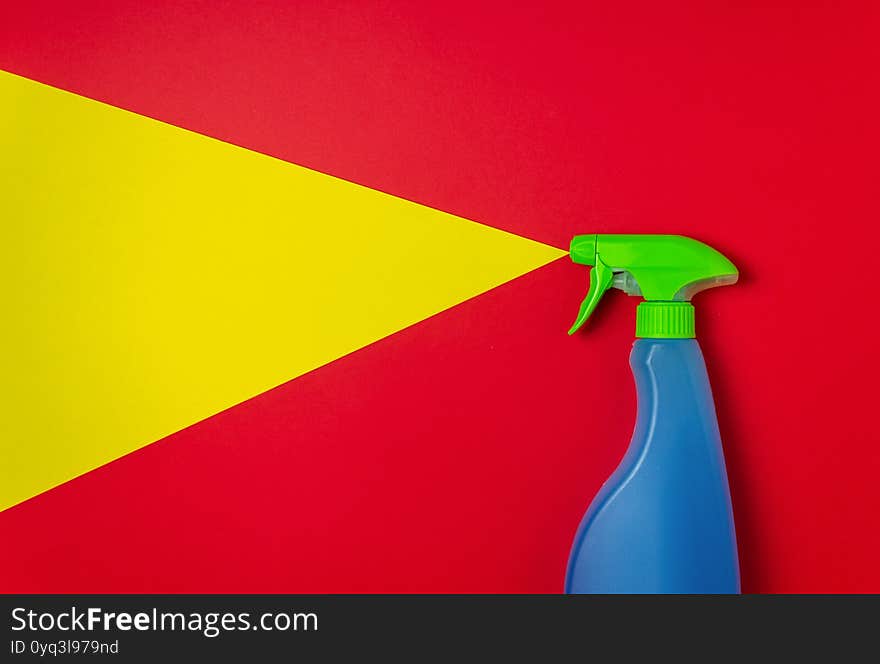 Cleaning Agent On A Red Yellow Background. Cleaning. Minimal Concept. Copy Space