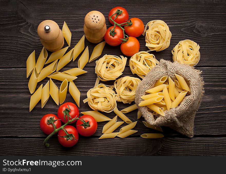 Pasta on wooden background.spaghetti on wooden table