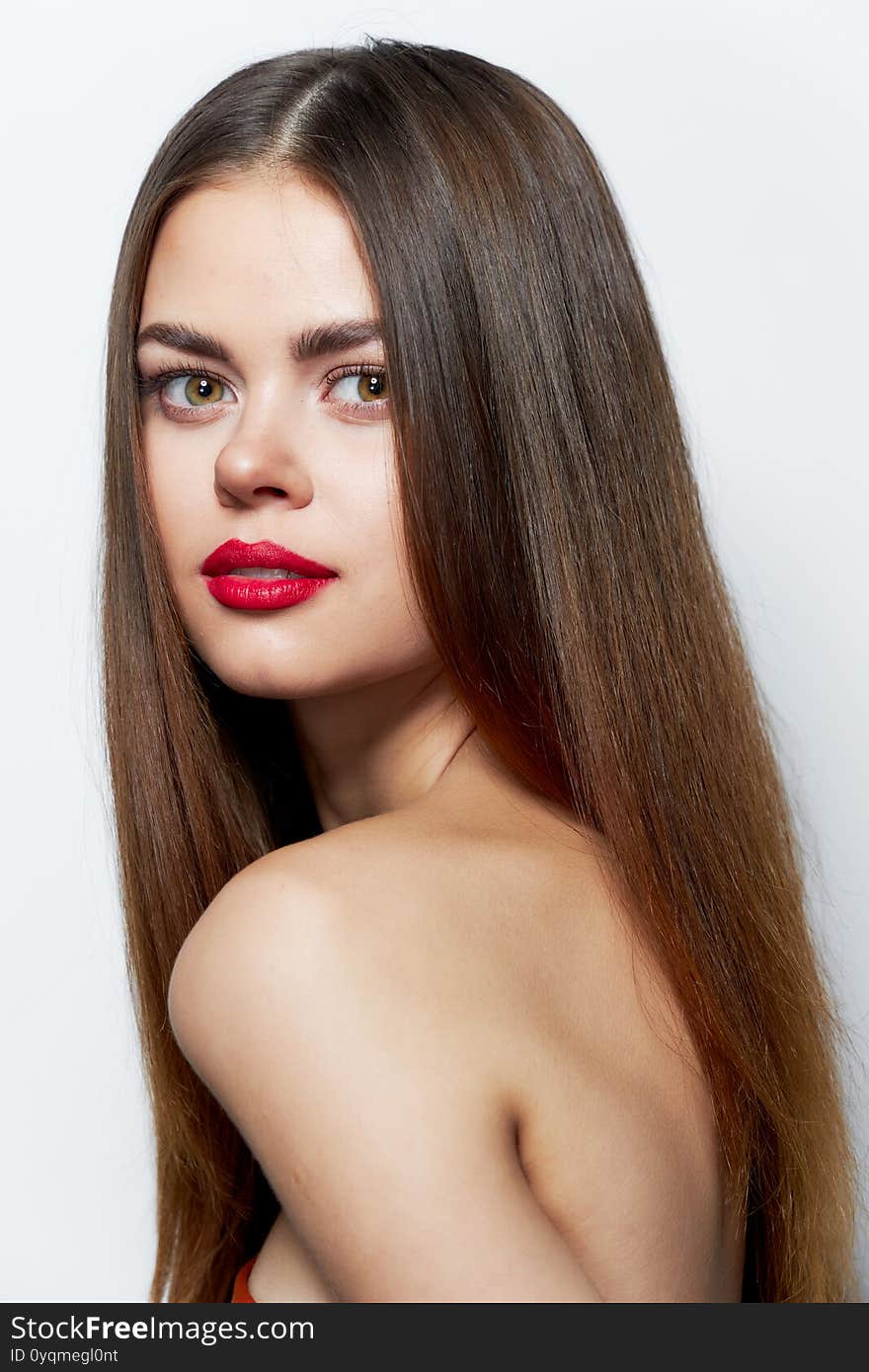 Woman with bare shoulders Confident look of sexy appearance red lips close-up