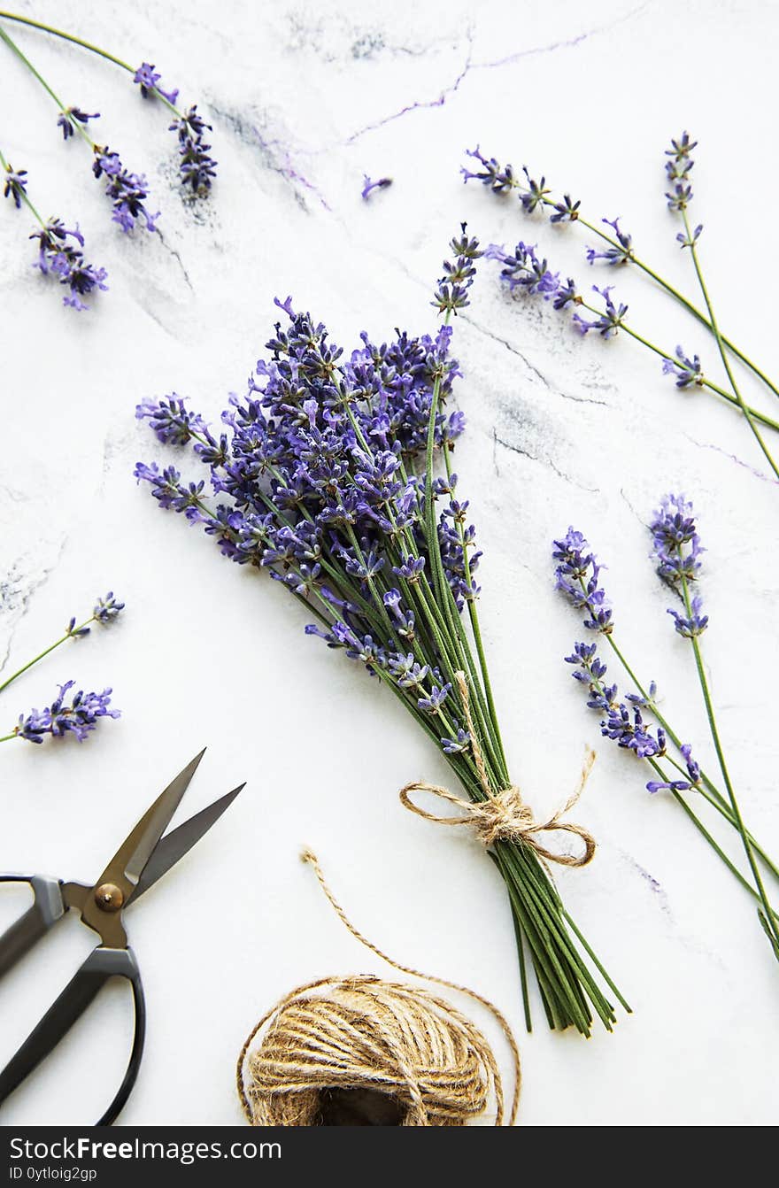 Lavender flowers, scissors and rope