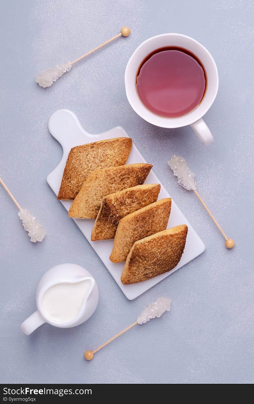 Traditional shortbread cookies with cinnamon and sugar on a stone background. Selective focus