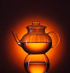 Teapot Of Tea On A Dark Background1 Stock Image