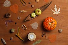 Autumn Flatlay On A Wooden Background With Orange Pumpkin, Apples And Dry Leaves. Horizontally,over The Head Stock Images