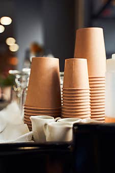 Focused Paper Cups Stack In Cafe Royalty Free Stock Photography