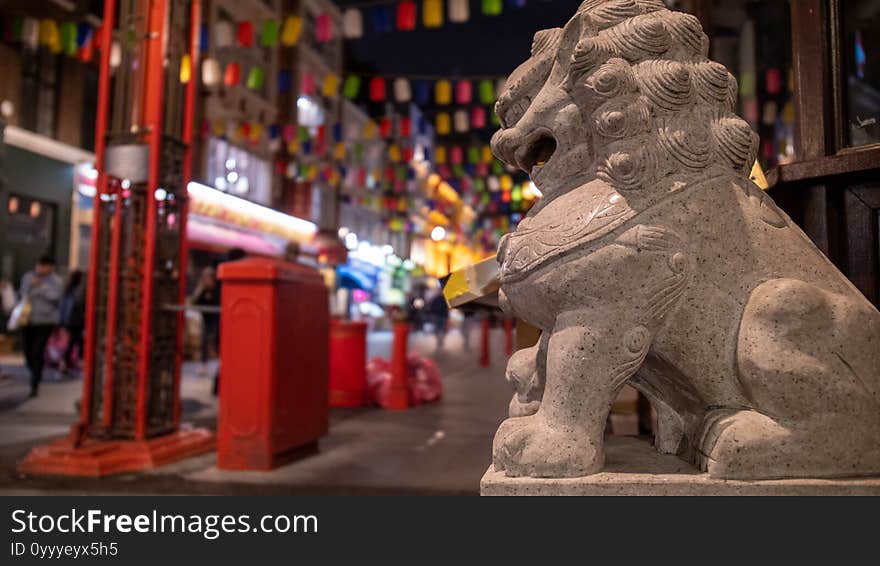 Lion statue in front of the china town gate London 25 Sep 2020. Lion statue in front of the china town gate London 25 Sep 2020