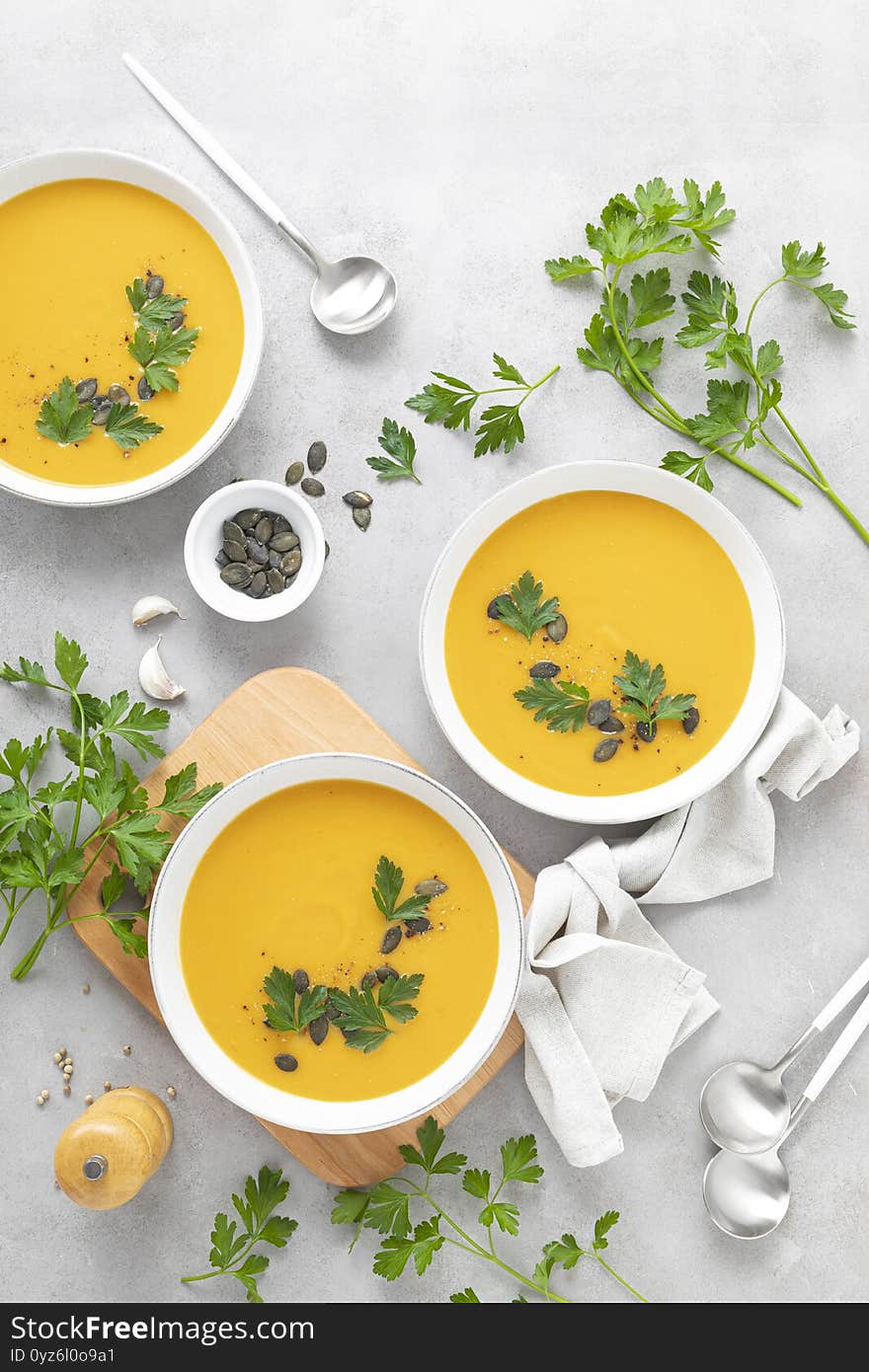 Vegan pumpkin soup with garlic and parsley