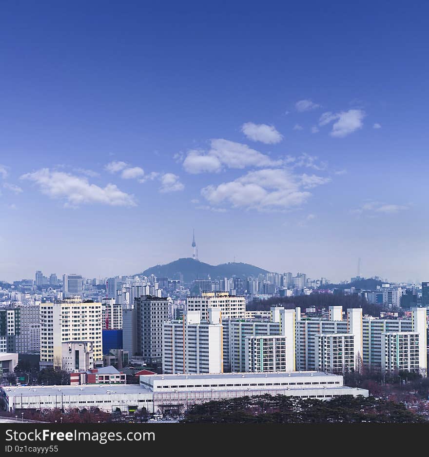 Seoul cityscapes with high-rise office buildings and skyscrapers in Seoul city, Republic of Korea in winter blue sky and cloud