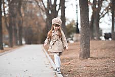 Trendy Cute Kid Girl Outdoors Stock Photo