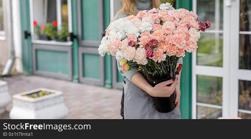 Floristry concept. bouquet of beautiful flowers. Spring colors. the work of the florist at a flower shop