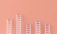 Stairs Random Collection With One Overhanging On Pastel Orange Wall. Leadership, Success Concept With Copy Spaces For Text. 3d Stock Photos