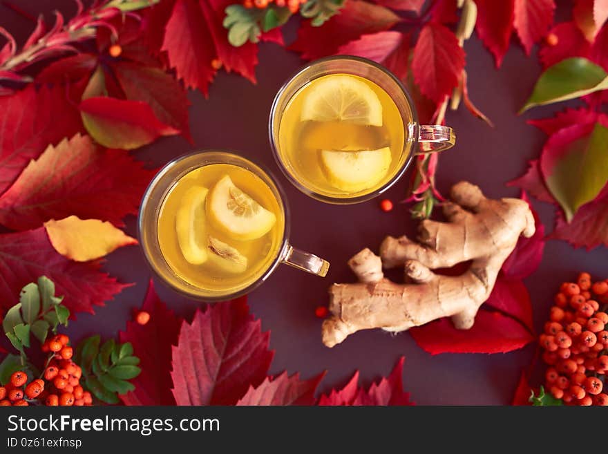 Autumnal composition with two cups of ginger tea