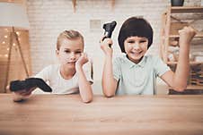 Little Girl Upset That She Lost In A Video Game. Stock Photo