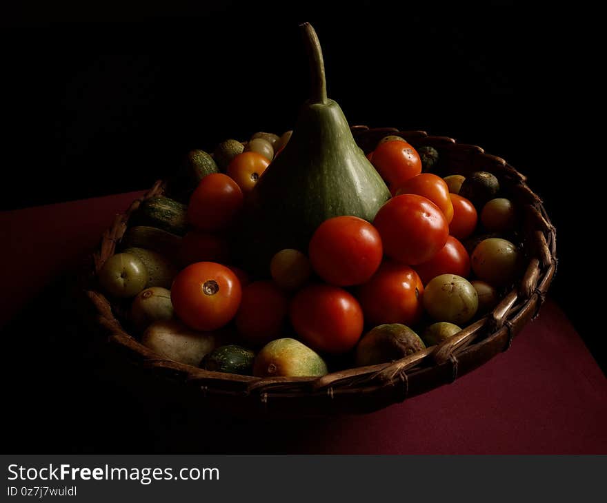 A basket full of vegetables , indian market