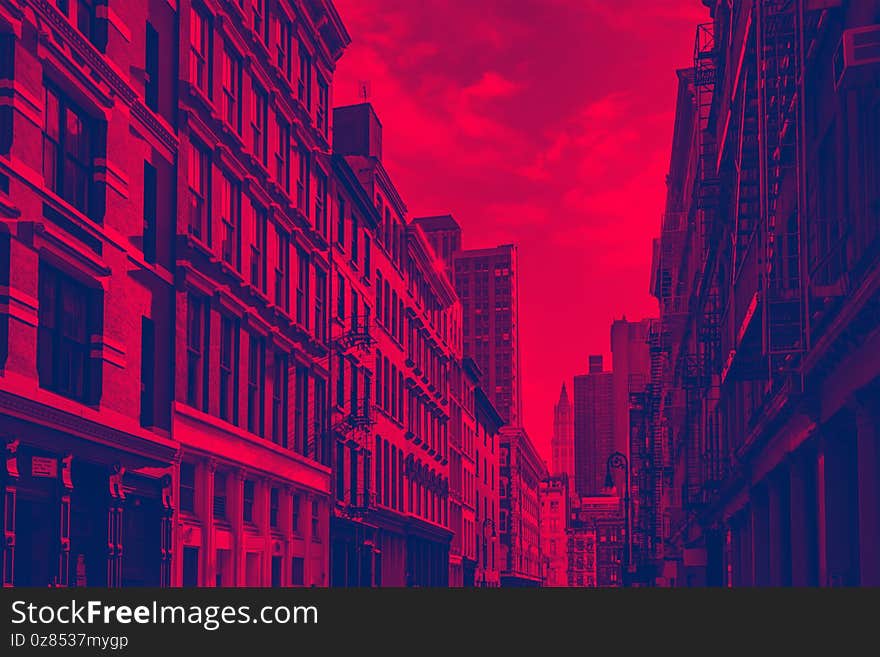 NYC street view in the Soho neighborhood of New York City with red and blue duotone colors