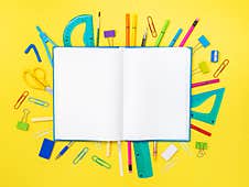 Back To School, Education Concept. School Tools Around Notebook Stock Photo