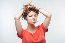 Image Of Stressed Blonde Girl Grabbing Her Head. Problems, Surprise, Fear, Fobia Concept. Studio Shot, White Background Royalty Free Stock Photography