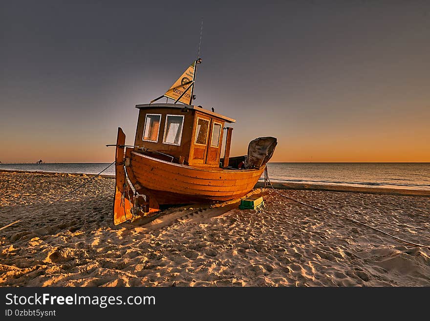 fishing boat on the beach of Usedom in the morning