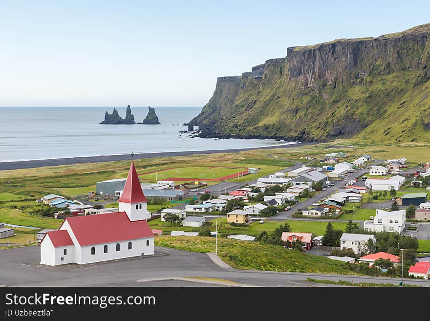 View over village and church of Vik in Iceland