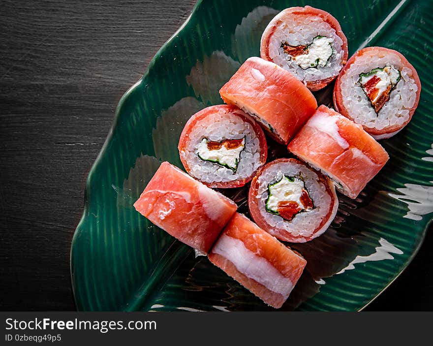 Sushi roll with fish and rice