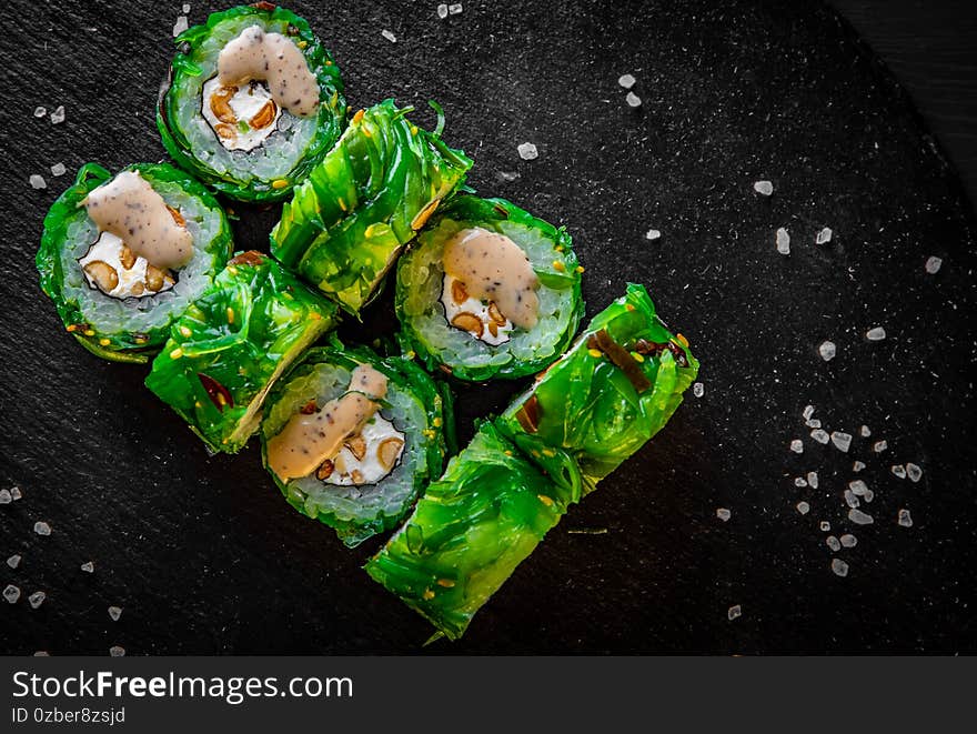 Sushi roll with fish and rice