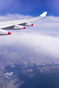 Aerial View Of Tokyo-Kawasaki Industrial Zone Area, Japan From Window Airplane With City / Sea Background, Tokyo-Kawasaki, Japan Stock Photo