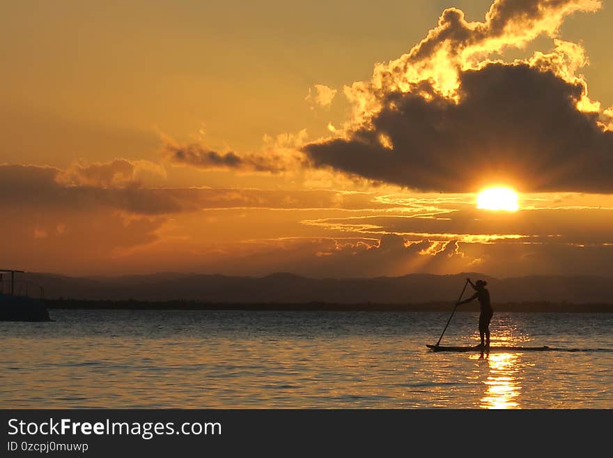 Spectacular golden sunset at the beach of Barra Grande. Located in the Bahia State in Brazil, BG is a paradise for stand up, snorkel and all sorts of beach and sea activity. Crystal clear waters and astonishing views to the Camamu Bay are cherished equally by locals and visitors from all over the world. Spectacular golden sunset at the beach of Barra Grande. Located in the Bahia State in Brazil, BG is a paradise for stand up, snorkel and all sorts of beach and sea activity. Crystal clear waters and astonishing views to the Camamu Bay are cherished equally by locals and visitors from all over the world.