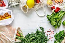 Stylish Composition On The Marble Table With Zero Waste Bags, Nuts, Seeds, Eggs, Bio Vegetables And Eco Fruits. Stock Photos