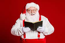 Portrait Of His He Attractive Cheerful Cheery Funny Amazed Fat White-haired Santa Reading Interesting Book Isolated Over Stock Photos