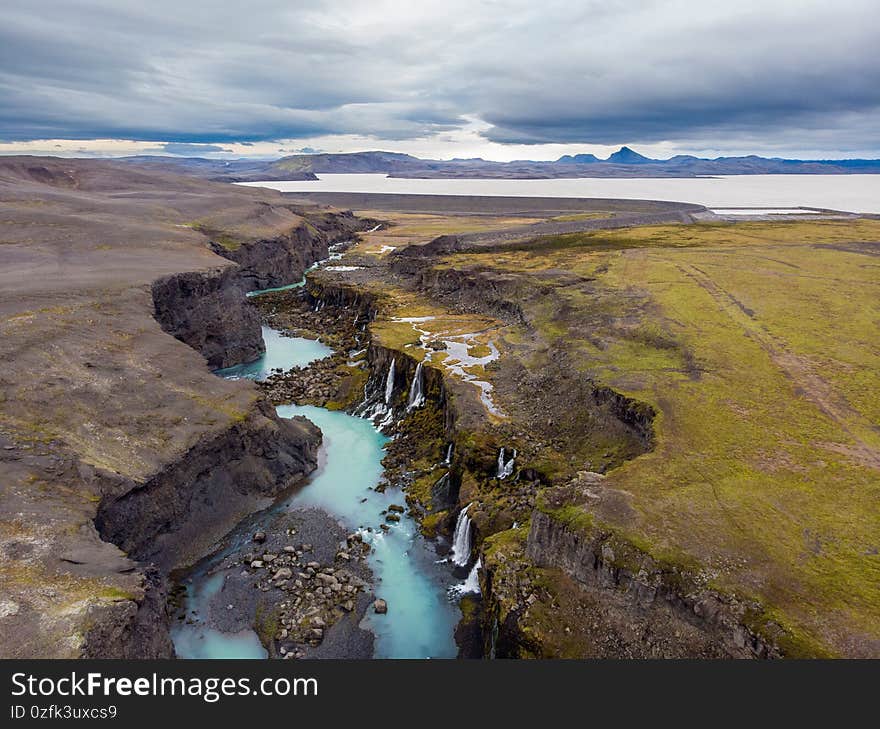 Scenic landscape view of incredible Sigoldugljufur canyon in highlands with turquoise river, Iceland. Volcanic landscape on