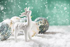 Christmas Festive Background. Deer And Christmas Decoration In Snow. Xmas And Happy New Year Theme Royalty Free Stock Photos