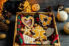 Christmas Gingerbread Cookies Decorated With Sugar White Icing In A Wooden Box On A Dark Background, Christmas Garland Christmas Stock Photo