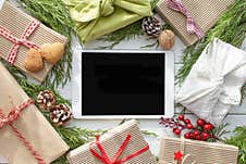 Shopping Online Christmas Flatly. Tablet For App Presentation. Top View, Copy Space. Purchase Presents, Prepare To Xmas Royalty Free Stock Image