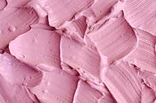 Pale Pink Cosmetic Clay Alginate Facial Mask, Face Cream, Body Wrap Texture Close Up, Selective Focus. Abstract Background Stock Photos