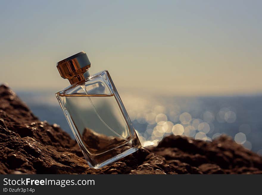 Perfume on the background of the sea. Perfume on the background of the sea