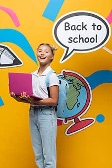 Schoolgirl Holding Laptop Near Speech Bubble Stock Photography