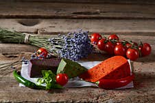 Three Different Colored Gourmet Cheeses Stock Photos