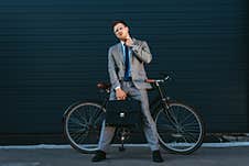 Businessman With Briefcase Looking At Camera Stock Image