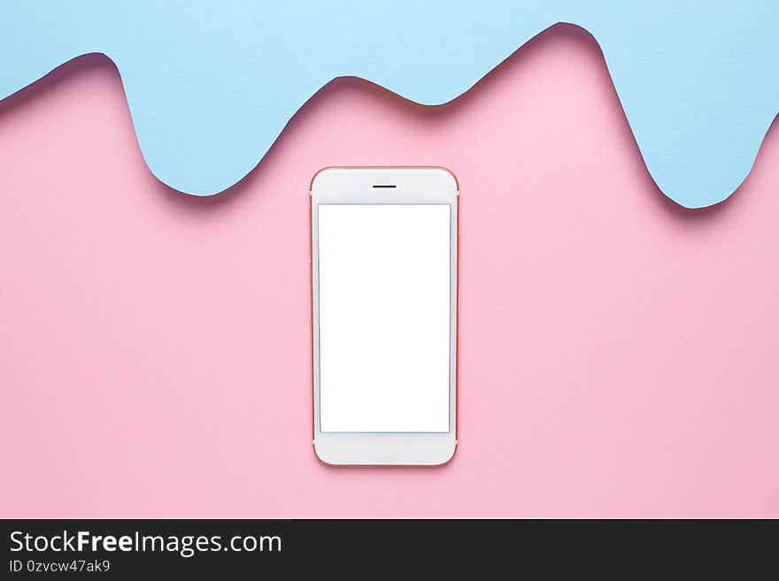 Mobile phone and Abstract paper cut blue waves art on pink background, pastel colors and technology