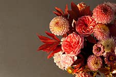 Floral Composition Of Dahlia Flowers, Roses And Autumn Leaves. Stock Image