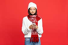 Asian Woman In Hat And Scarf Stock Photos