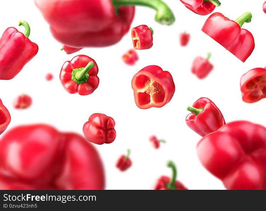 Sweet red pepper sliced and falling isolated on a white background