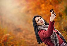 Selfie In Autumn Park Stock Photos