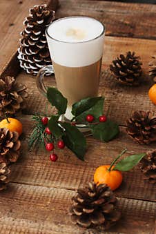 Coffee Latte And Forest Cones On The Table Royalty Free Stock Photography