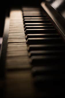 Old Piano Keyboard, With Shallow Depth Of Field Royalty Free Stock Image