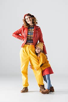 Daughter In Colorful Red And Yellow Stock Photography