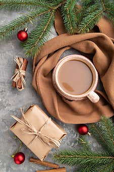 Christmas Or New Year Composition. Decorations, Fir And Spruce Branches, Cup Of Coffee, On A Gray Concrete Background. Top View Royalty Free Stock Photography