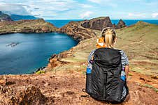 Girl Enjoing View Rocky Cliffs Clear Water Of Atlantic Ocean Bay Ponta De Sao Lourenco, The Island Of Madeira, Portugal Stock Images