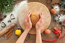 The Process Of Cooking Christmas Gingerbread. Christmas Cooking On A Brown Wooden Background. Royalty Free Stock Photos