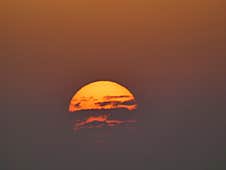 Battle Between The Sun And The Clouds During A Sunset In Summer In The Camargue In Provence Stock Photography