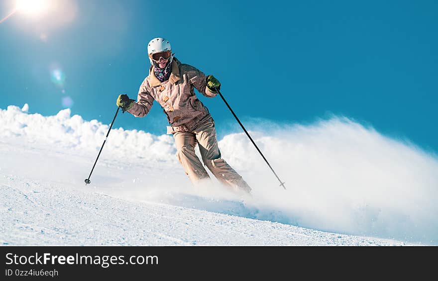 Woman skiing on mountain top